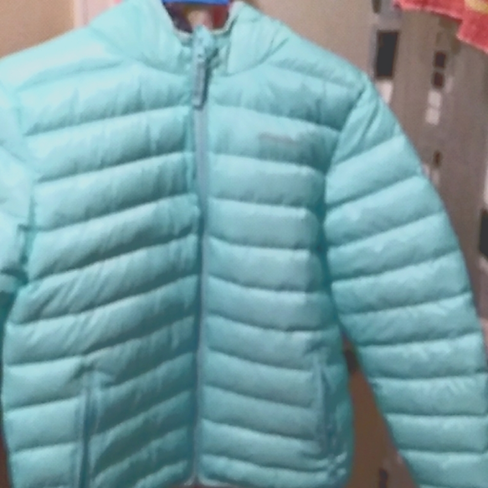 Girls Eddie bauer's reversible puffy coat,junior size 10/12 teal& some design.
